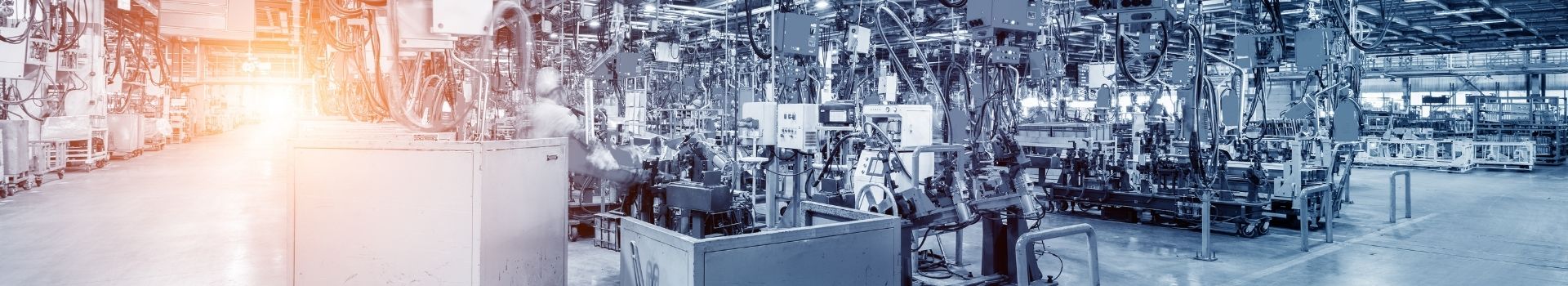 panoramic of manufacturing floor with dark blue tint over top